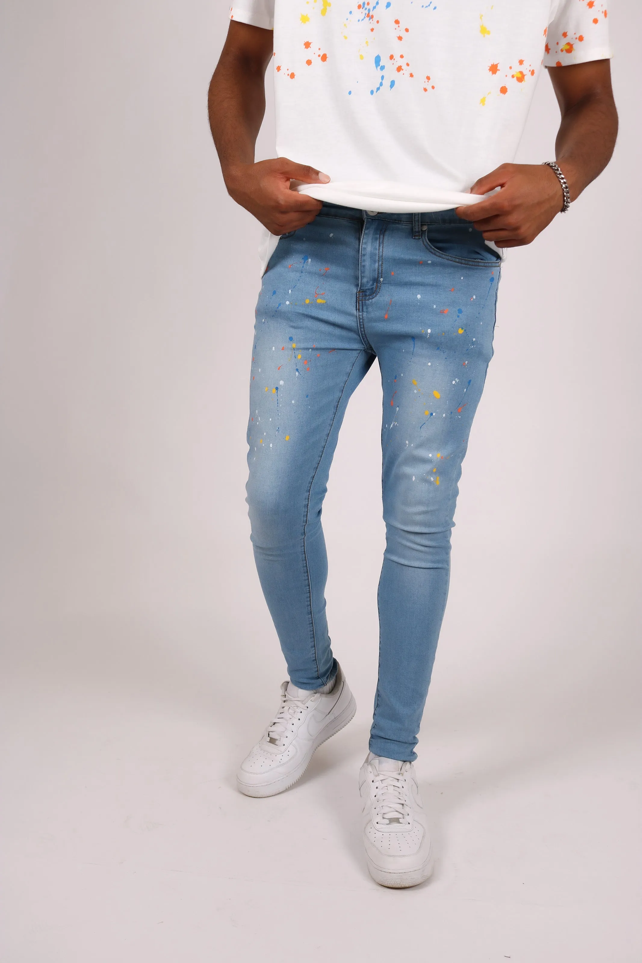 Logan Stonewash Paint Splatter Skinny Jeans