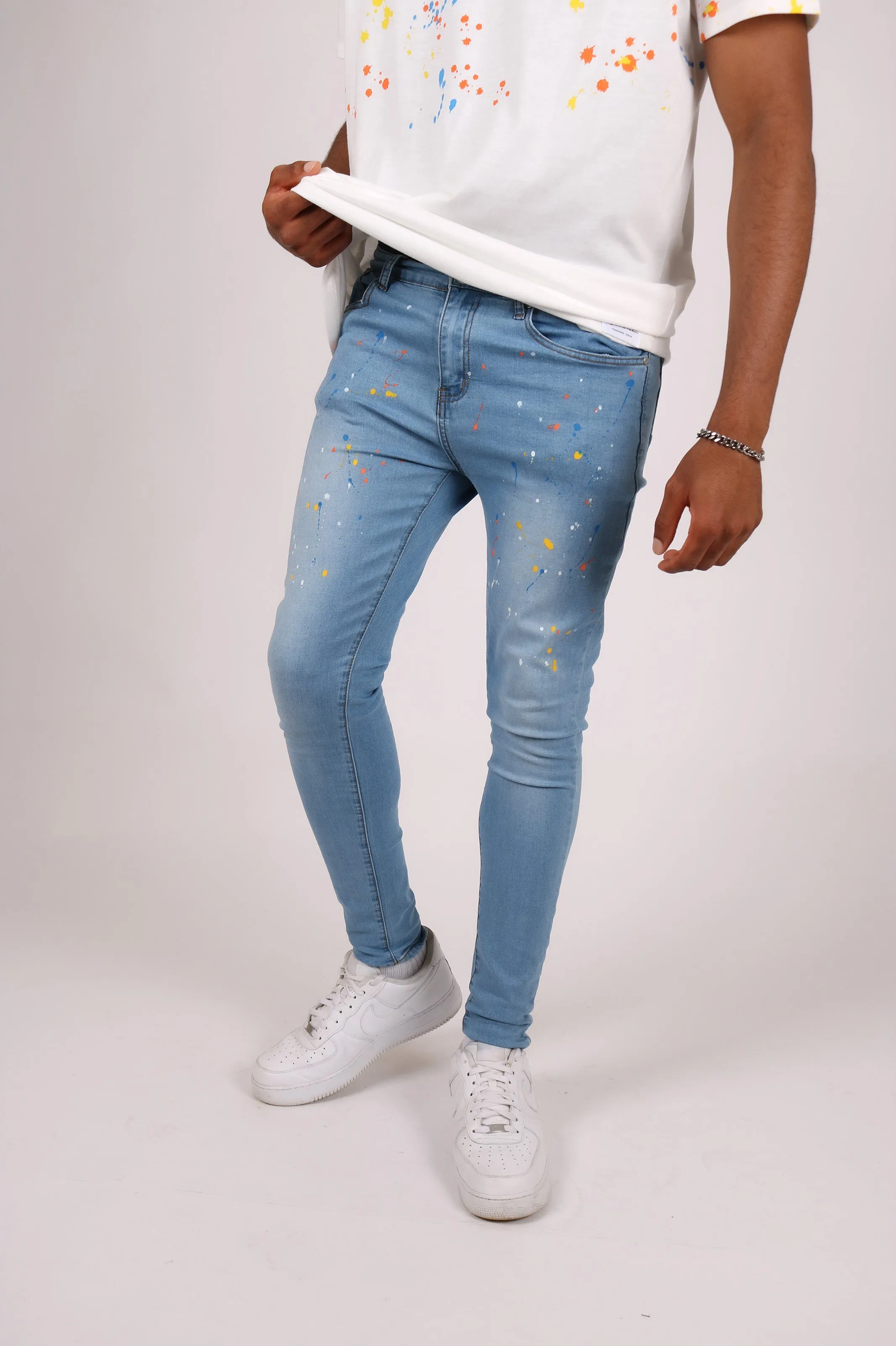 Logan Stonewash Paint Splatter Skinny Jeans