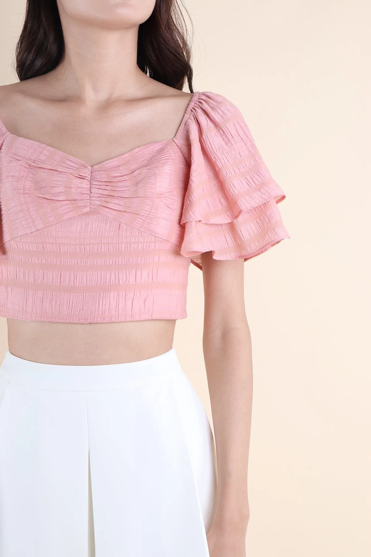 LUMI FLUTTERS TOP IN PINK