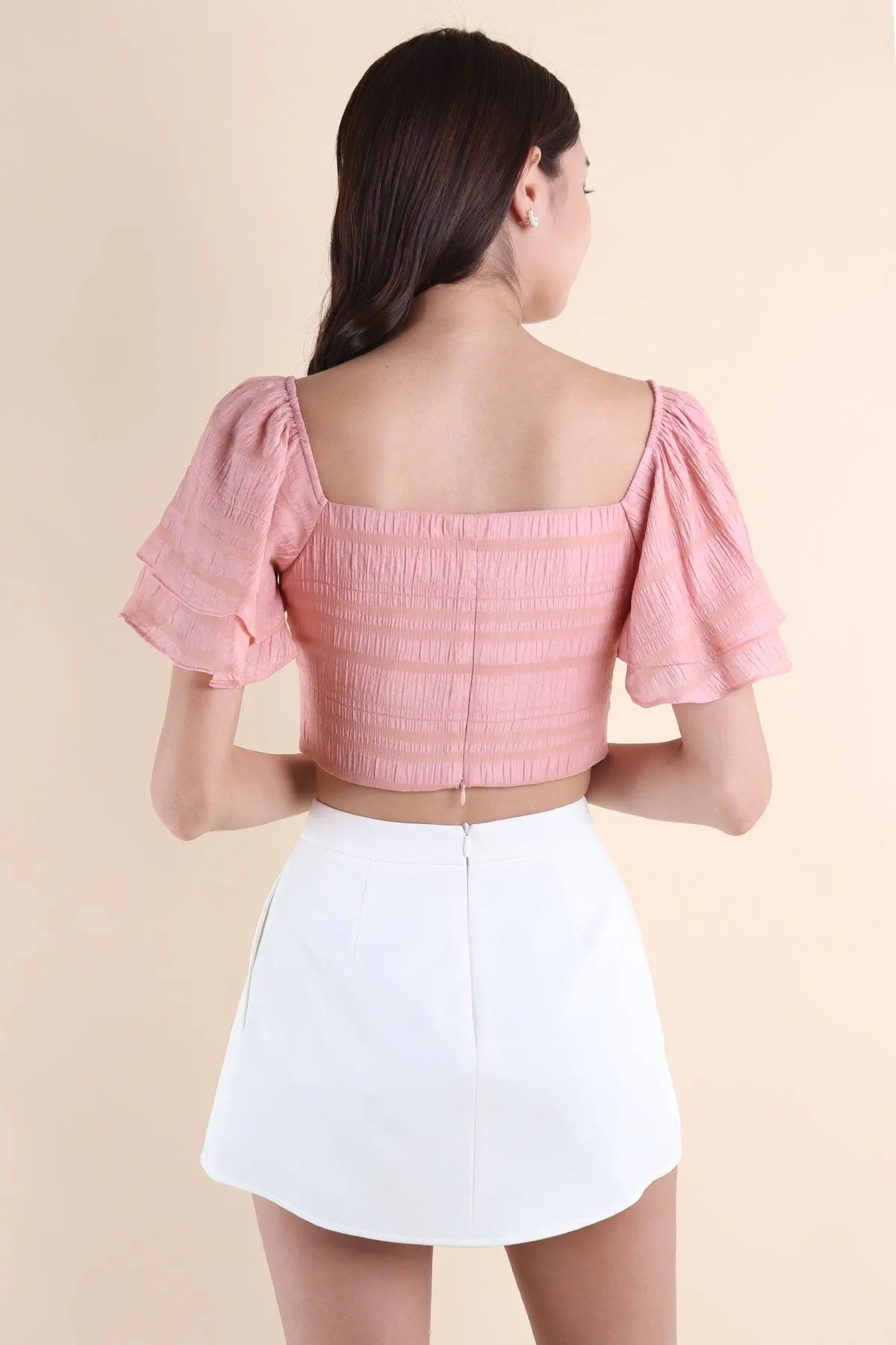 LUMI FLUTTERS TOP IN PINK