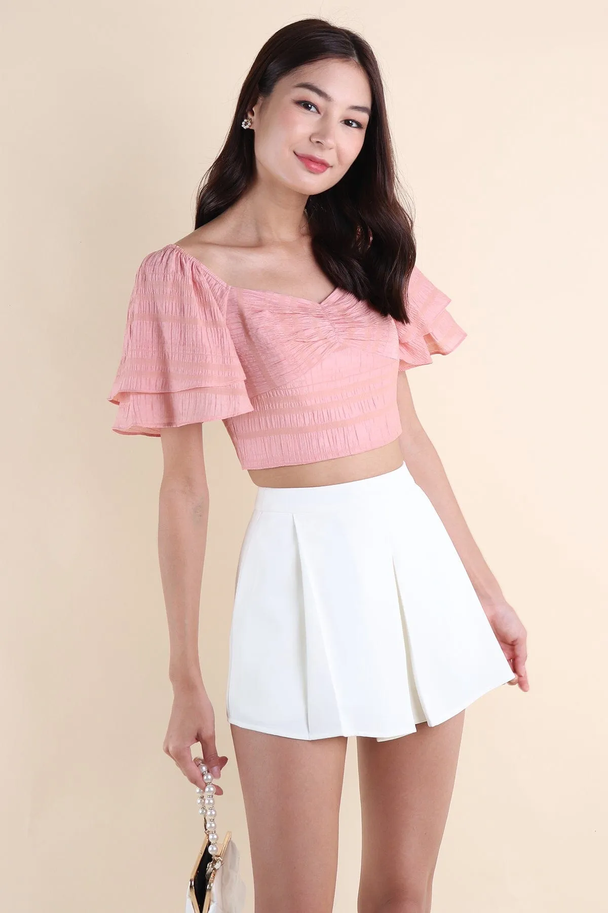 LUMI FLUTTERS TOP IN PINK